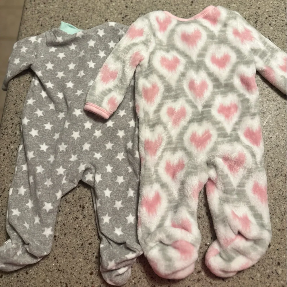 0-3 Month Fuzzy Footed Sleepers.